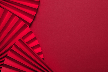 Fototapeta premium Chinese New Year 2023 .Decor pattern fan on red background. Red paper fans .Lunar New Year banner template. Color of the year 2023 viva magenta.color pantone Lunar New Year,chinese banner