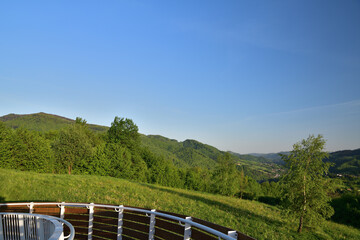 Fototapeta premium View of the landscape from the hiking trail above the trees