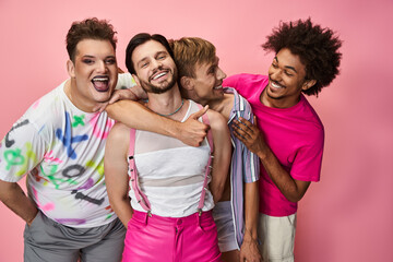 Friends in colorful outfits share laughter and joy in a vibrant atmosphere.