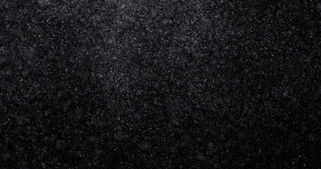Natural white winter snowfall on a black background 3d rendering