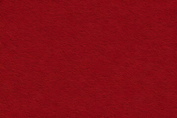 Dark red textured background creating visual interest