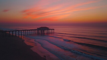 Vibrant sunset over ocean pier.