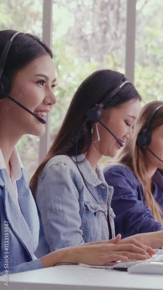 Aufkleber customer support agent or call center with headset works on desktop computer while supporting the cu