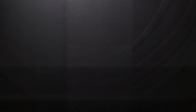 控えめな照明とコピースペースのある黒い壁