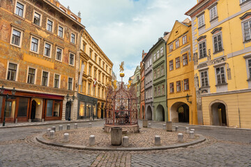 Picturesque square with medieval buildings in the UNESCO city center of Prague, Czechia.
