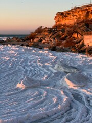 The Ice waves on the shore of Caspian Sea at the sunrise or sunset. Aktau, Kazakhstan.