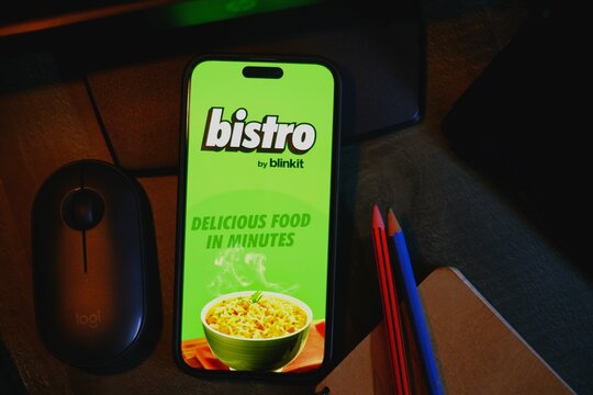 Delhi, India - December 13, 2024 : Bistro blinkit App on smartphone, Zomato's Blinkit launches Bistro, 10-minute food delivery app.
