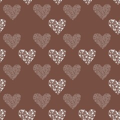 Seamless pattern for Valentines Day with hearts consisting of white heart outlines and white filled hearts on a mocha mousse background. Perfect for textile, fabric, wrapping paper, backdrop, bedding 