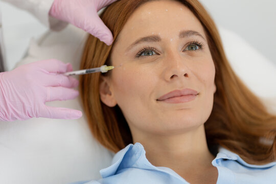 Enhancing beauty with dermal filler therapy in a serene clinic environment during a sunny afternoon