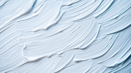 Obraz premium Abstract white textured brushstroke pattern on smooth surface close-up.