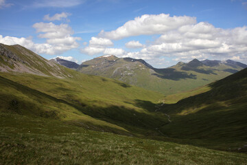 Fototapeta premium Ascent path to Binnein Mor and Na Gruagaichean - View towards Glen Nevis and water of Nevis valley - Mamores - Highlands - Scotland - UK