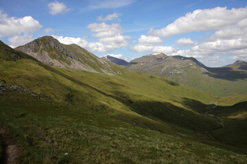 Fototapeta premium Ascent path to Binnein Mor and Na Gruagaichean - View towards Glen Nevis and water of Nevis valley - Mamores - Highlands - Scotland - UK