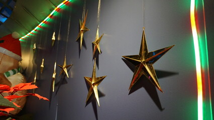 Golden Hanging Stars with Festive Lighting