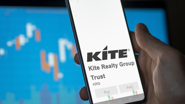 March 26th 2024, logo of Kite Realty Group Trust on a white wall in a hall building, the $KRG brand indoor.