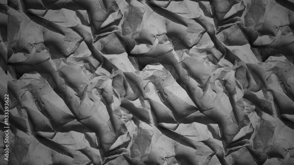 Poster an abstract textured background in shades of gray, featuring a pattern of wrinkles and folds, ideal 