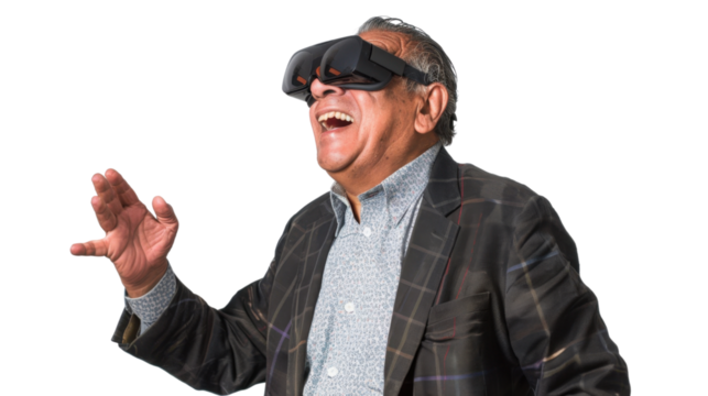 Mexican senior businessman watching vr glasses laughing and gesturing with hand on white background