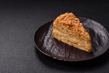 Piece of sweet layer cake Napoleon with custard