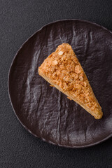 Piece of sweet layer cake Napoleon with custard