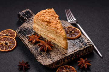Piece of sweet layer cake Napoleon with custard