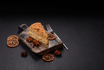 Piece of sweet layer cake Napoleon with custard