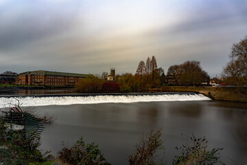 A long exposure of the River Derwent in the centre of Derby, Derbyshire, UK