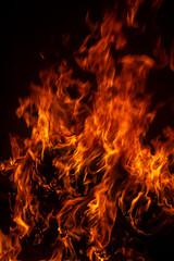 Abstract blaze fire flame texture for banner background. Fire flames on black background. Fire...