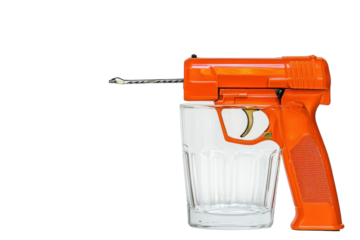 Staple Gun Placed Inside a Clear Glass with Isolated Background with isolated on transparent background