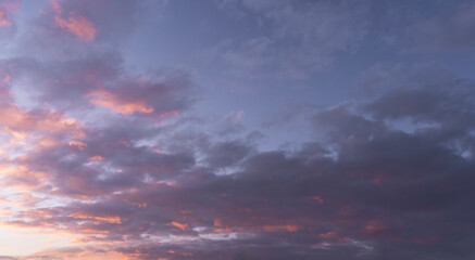 Sunset sky background. Beautiful evening sunset sky with clouds.