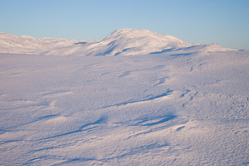 evening light over a beautiful winter landscape in norway