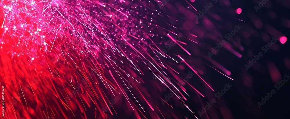 Poster pink and red sparks are falling against a black background, creating a vibrant and dynamic abstract 