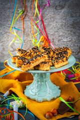 Homemade sheet pan hazelnuts cookie bar chips with roasted chopped hazelnuts chocolate glaze...