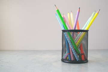 Colored pencils in a holder