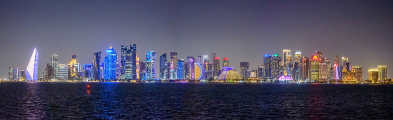 Fototapeta premium Panoramic view of skyscrapers from the seaside in Doha, Qatar