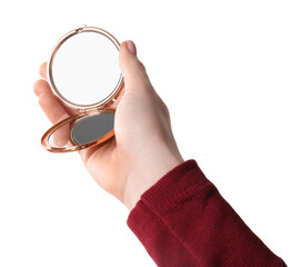 Woman holding pocket mirror on white background, closeup