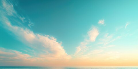 Obraz premium Soft light blue, beige sky gradient background. Gentle clouds float on pastel sky. Calm sea below. Peaceful, serene atmosphere. Perfect for nature, travel, relaxation, or soft style design themes.