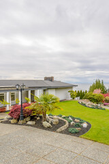 Two story luxury house with beautiful summer  landscape in Vancouver, Canada, North America. Day...