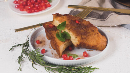 Sweet French toast slices sprinkled with cinnamon and sugar