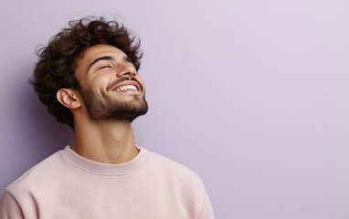 Obraz premium man smiling with sweatshirt in color background
