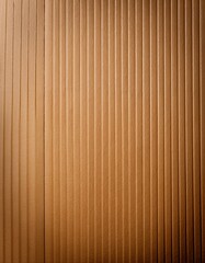 Fototapeta premium Close-up of a textured, light brown surface with vertical lines.
