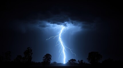 A dramatic lightning strike illuminates a dark sky, showcasing nature's power.