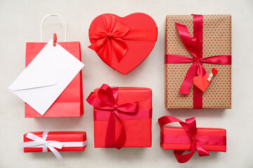 Gift boxes and envelope on white background. Valentine's Day celebration