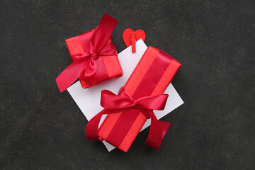 Gift boxes on black background. Valentine's Day celebration