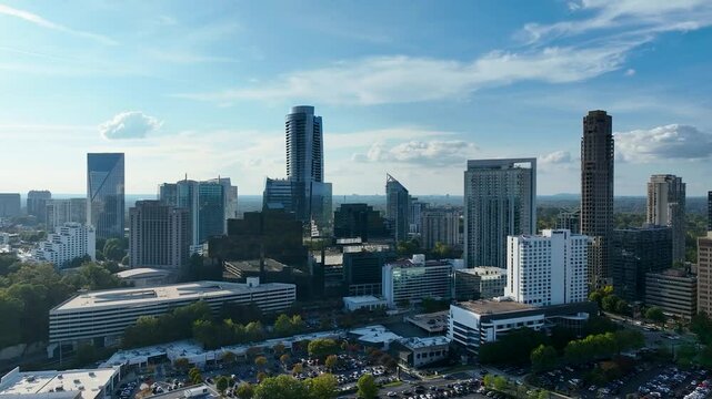 Smooth 4K drone footage of buildings and blue sky in Atlanta Georgia.  Aerial footage of Buckhead Atlanta's great skyline.