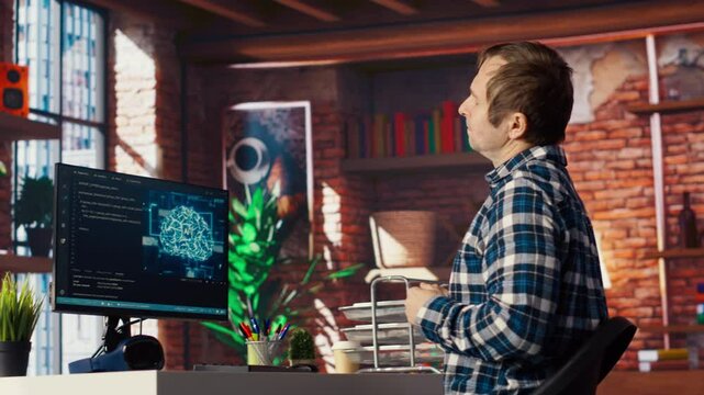 AI engineer in home office stretching back while looking at PC screen, feeling fatigued while executing code. Artificial intelligence developer feeling backpain, relieving pain, testing code, camera B