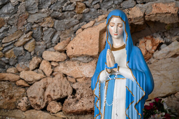 Our Lady of Lourdes – a statue in a grotto near the Church of the Sacred Heart of Jesus in...