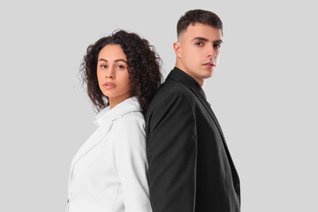 Young couple on white background. Yin Yang concept