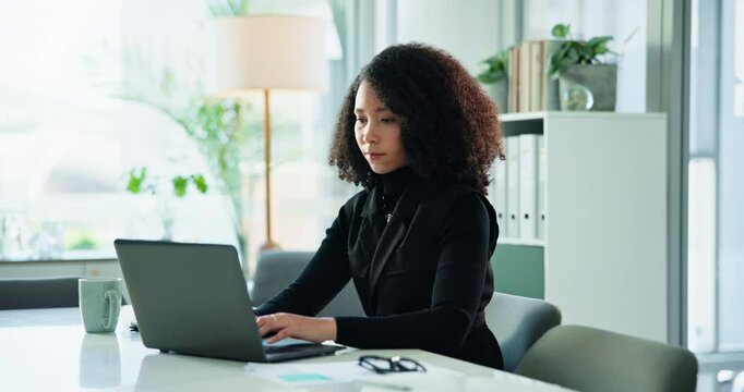 Laptop, typing and business woman in office for planning, review update or reading compliance feedback. African worker, computer and writing email for policy development, rules or regulation report