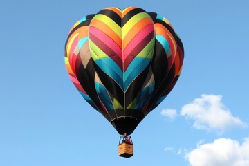 Fototapeta premium Colorful Hot Air Balloon Soaring in a Blue Sky