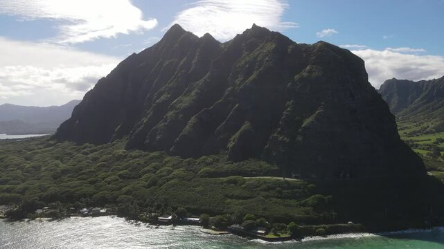 Scenic drone B-roll aerial overview of Kaaawa Beach, Mokolii Island, Oahu Hawaii