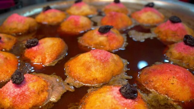 Traditional torrejas served in their essence, highlighting their golden color and soft texture, bathed in a sweet syrup that enhances their authentic flavor